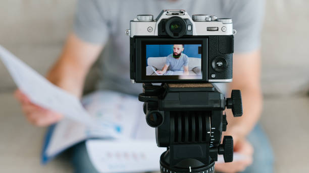 istock equipment video shooting man camera tripod blog 1041922852