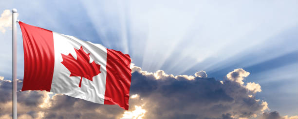 istock Canada flag on blue sky. 3d illustration 1041923856