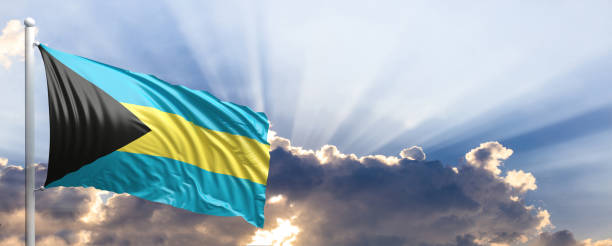istock Bahamas flag on blue sky. 3d illustration 1041923908