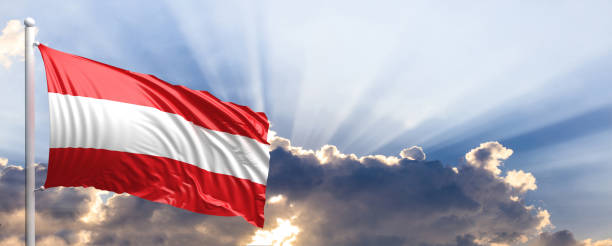istock Austria flag on blue sky. 3d illustration 1041923918