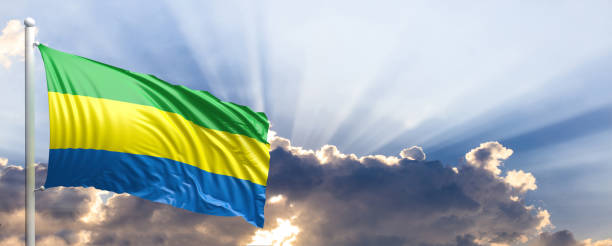 istock Gabon flag on blue sky. 3d illustration 1041924082