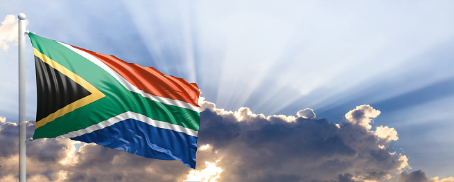 South Africa waving flag on blue sky. 3d illustration
