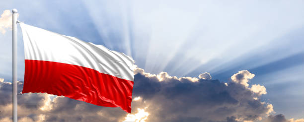 istock Poland flag on blue sky. 3d illustration 1041924254