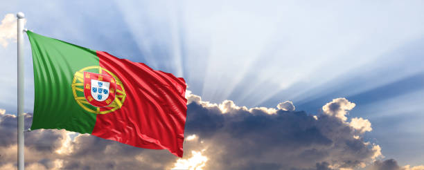 istock Portugal flag on blue sky. 3d illustration 1041924260