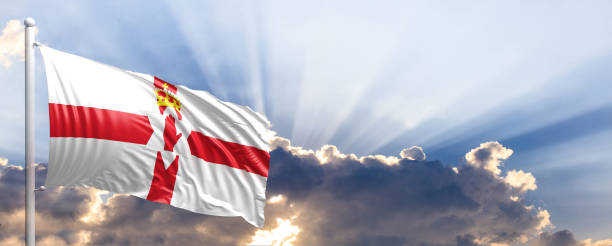 istock Northern Ireland flag on blue sky. 3d illustration 1041924274