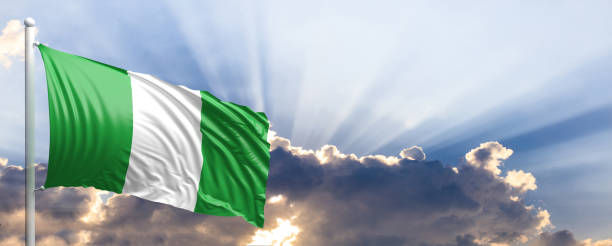istock Nigeria flag on blue sky. 3d illustration 1041924292