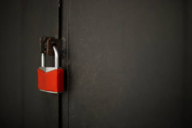 istock A red lock on the iron door 1041929612