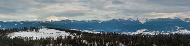Evening winter cloudy day mountain ridge