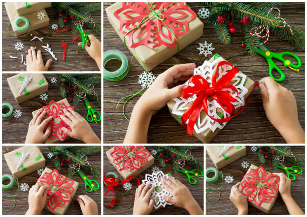 Packing collage presents for Christmas on wooden table. Handmade. Project of children's creativity, handicrafts, crafts for kids. Packing collage presents for Christmas on wooden table. Handmade. Project of children's creativity, handicrafts, crafts for kids. Diy Turn Artwork Into Presents stock pictures, royalty-free photos & images