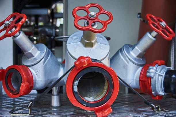 istock Fire crane for connection to a fire hydrant. There are fire truck equipment 1041939778