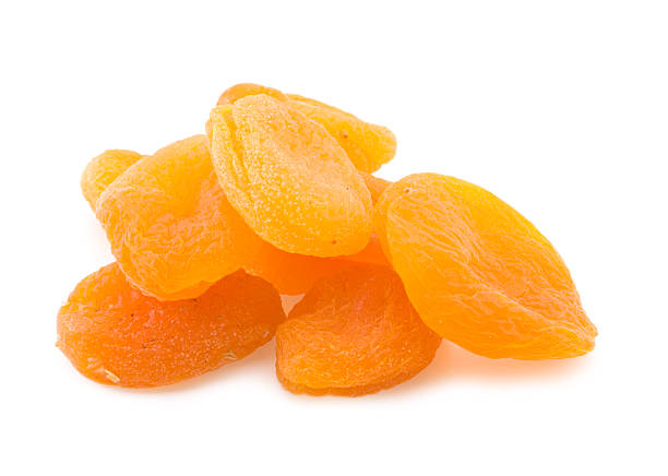 istock A pile of dried apricots on white 104195717