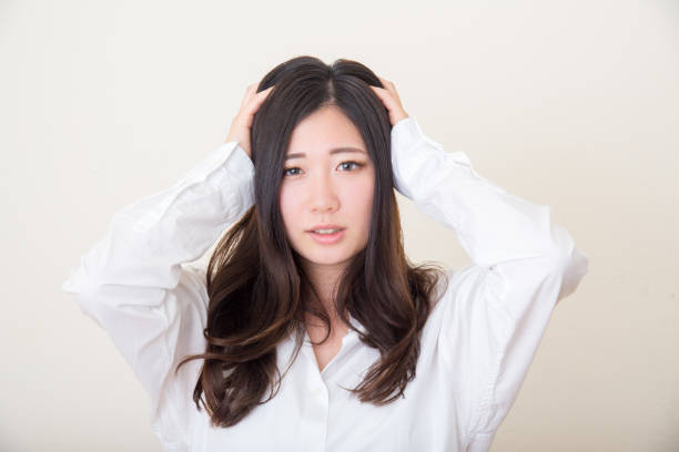 istock young asian woman getting mad 1041967812