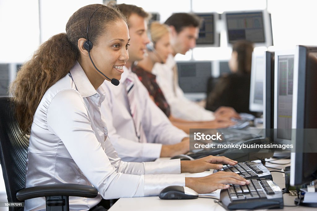Commercianti di lavoro al computer Stock - Foto stock royalty-free di Call centre