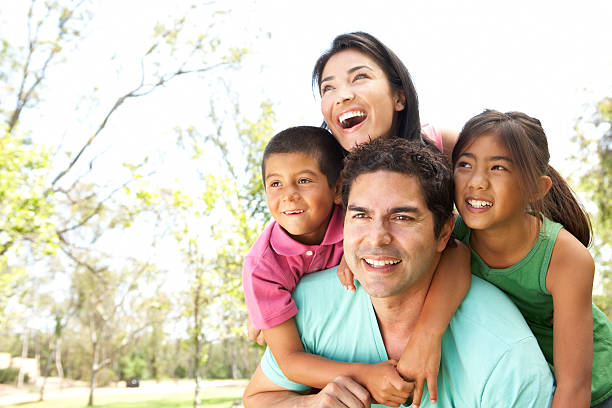 istock Young Family In Park 104197094