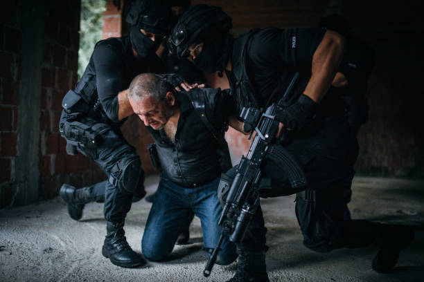 istock Police arresting a gangster 1041972364