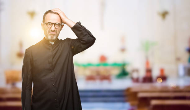 istock Priest religion man doubt expression, confuse and wonder concept, uncertain future 1041972478