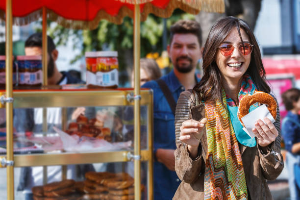 istock Tourist is showing a bagel - simit 1041991852