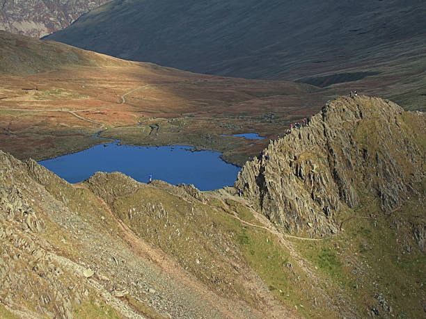 Scramblers on Striding Edge  striding edge stock pictures, royalty-free photos & images
