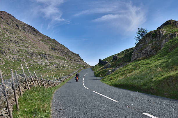 istock Motorcyclist on mountain road 104200177