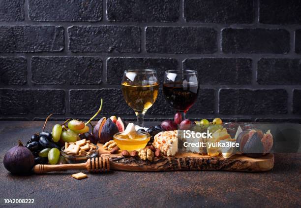 Cheese Plate With Grapes And Wine Stock Photo - Download Image Now - Antipasto, Tray, Almond