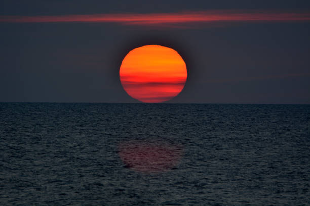 istock Sunset by the sea 1042010846