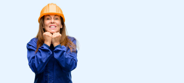 istock Engineer construction worker woman terrified and nervous expressing anxiety and panic gesture, overwhelmed 1042010922