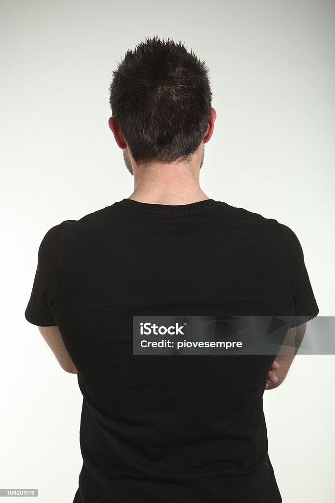 Portrait of the back of a man in a black shirt man portrait http://i705.photobucket.com/albums/ww51/piovesempre/banner_men2.jpg Men Stock Photo