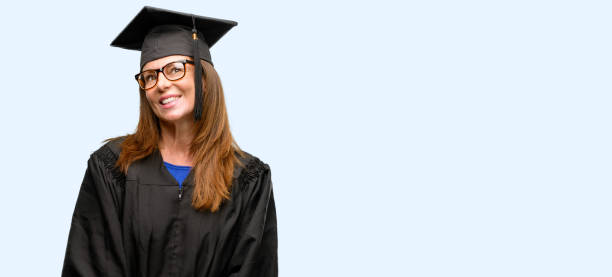 istock Senior graduate student woman thinking and looking up expressing doubt and wonder 1042014404