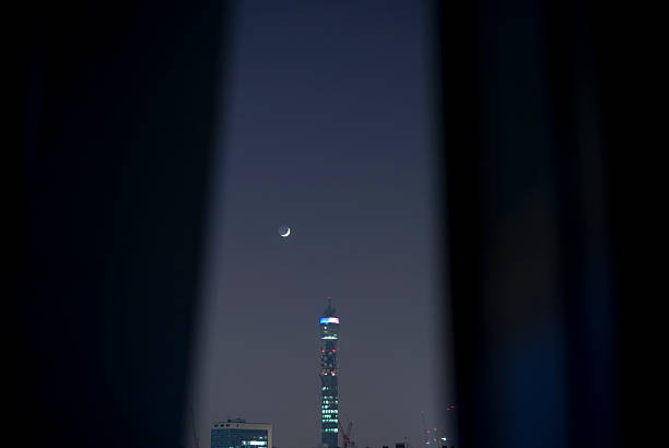 istock View of Telecom tower through curtains 104201608
