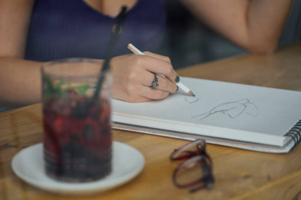 istock Artist working at coffee shop 1042016348