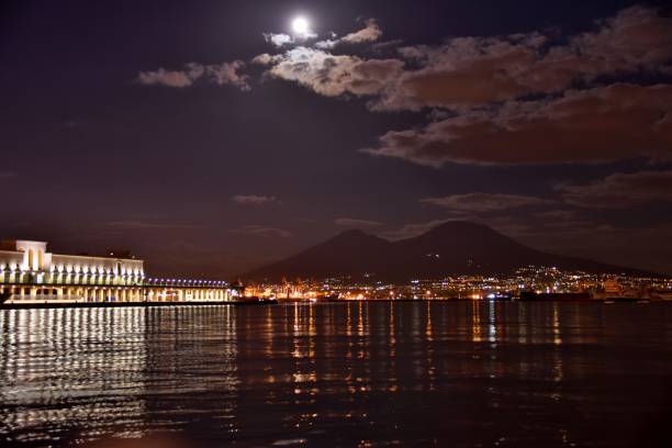 istock Vesuvio and Naple's harbour at night (Naples Bay) 1042016488
