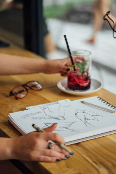 istock Artist working at coffee shop 1042016614