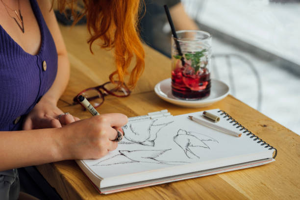 Artist working at coffee shop