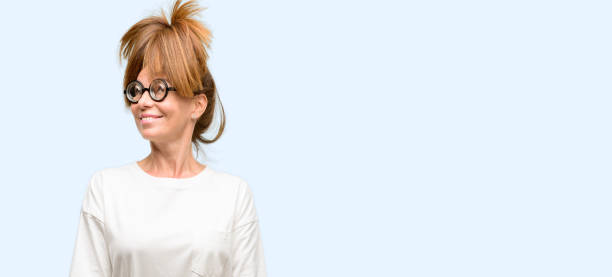 istock Crazy middle age woman wearing silly glasses thinking and looking up expressing doubt and wonder 1042016792