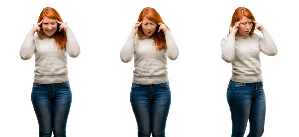 istock Young Beautiful redhead woman doubt expression, confuse and wonder concept, uncertain future 1042021764
