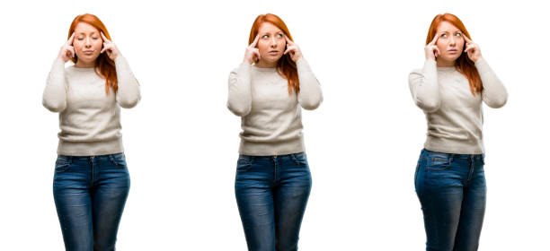Young Beautiful redhead woman doubt expression, confuse and wonder concept, uncertain future