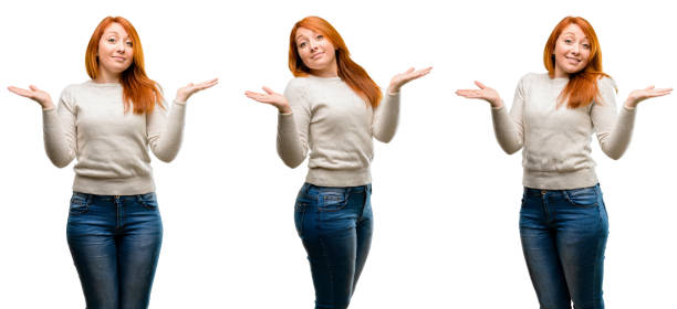 istock Young Beautiful redhead woman doubt expression, confuse and wonder concept, uncertain future 1042022180