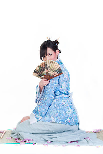 geisha in blue kimono stock photo