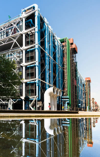 George Pompidou center in Paris, mirrored in a fountain, France stock photo