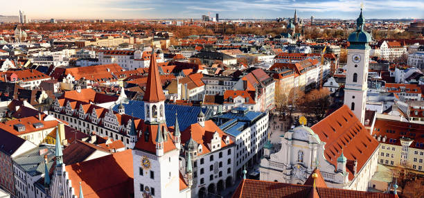 istock Munich center panoramic cityscape view with Old Town Hall and Heiliggeistkirche 1042026726