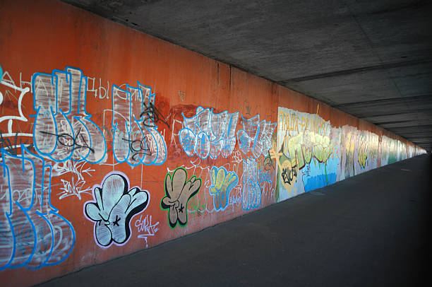 istock Concrete underground with colorful graffiti wall. 104202772