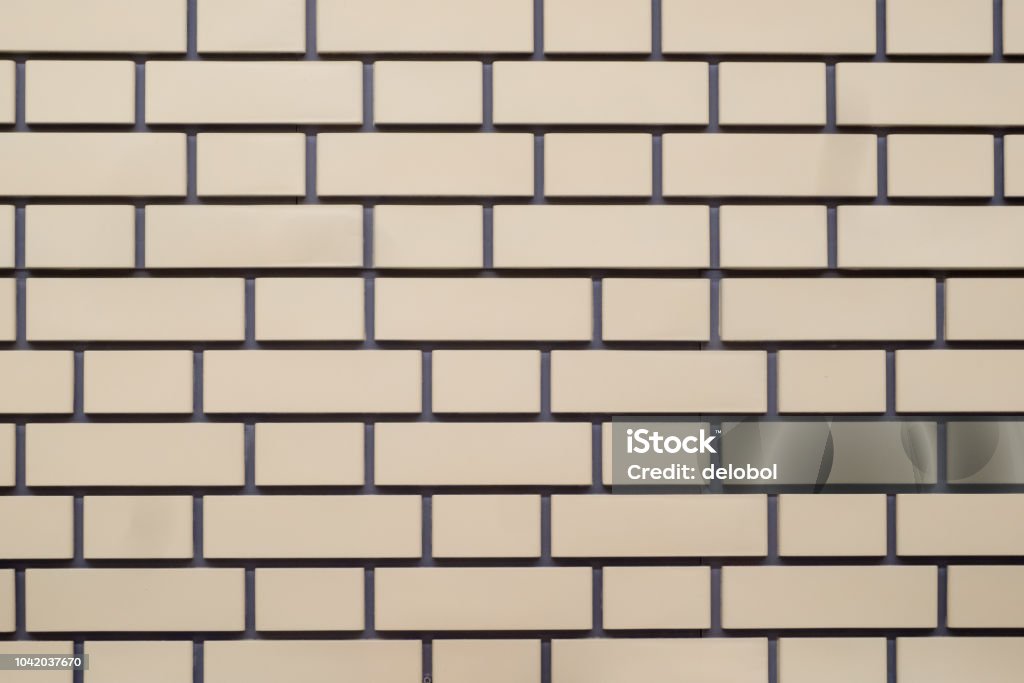 decorative brickwork brown and beige Brick Stock Photo