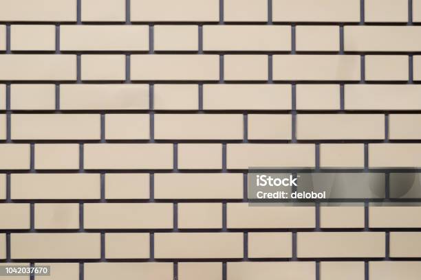 Decorative Brickwork Brown And Beige Stock Photo - Download Image Now - Brick, Brick Wall, Clay