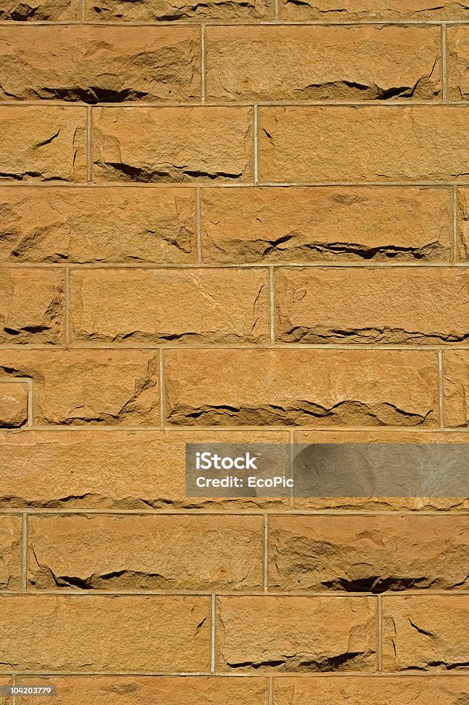 サンドストーンのレンガの背景 - カラー画像のロイヤリティフリーストックフォト