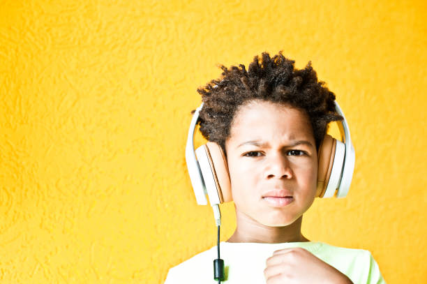 istock Little Boy Enjoying His Music 1042063302