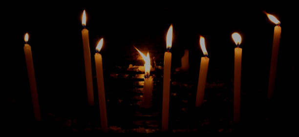 istock candle light in the dark 1042066380