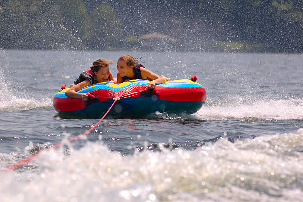 Tubing fun  jet boat stock pictures, royalty-free photos & images