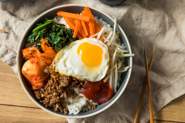 Spicy Homemade Korean Bibimbap Rice with Egg and Beef