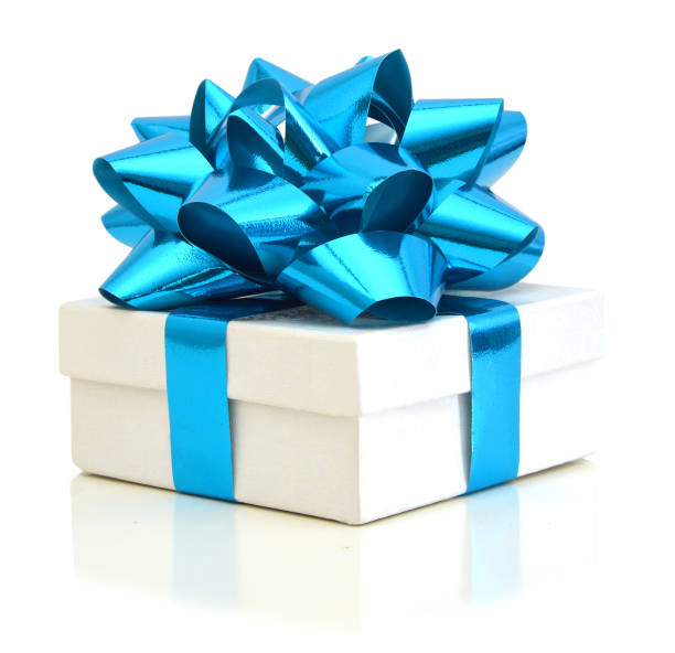 istock Gift box with ribbon and blue bow isolated on the white background, clipping path included. 1042074464
