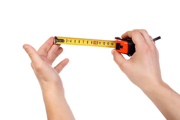 istock hands holding tape measure 104207956